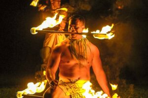 Fire-knife dancers perform live at the Aloha Kai Luau at Sea Life Park, Oahu.