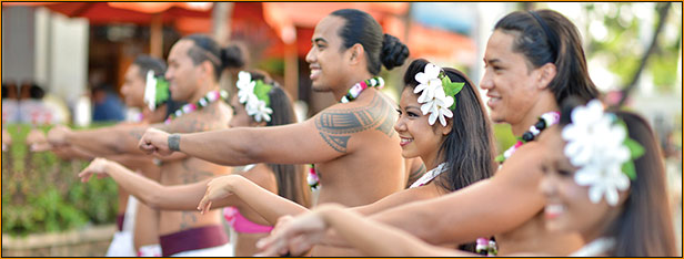 Pier-side hula dancers welcome passengers aboard the Star of Honolulu Sunset Dinner Cruise & Luau Show, Oahu.