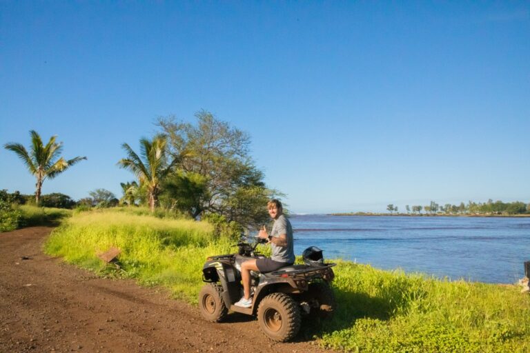 Guest on atv riding along the North Shore Oahu ATV tours