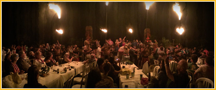 Celebrating couples dance while being serenaded at Chief's Luau, Oahu. 