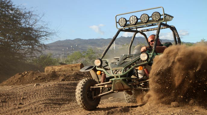 Kick up some dirt in a side-by-side ATV at Coral Crater Adventure Park, Oahu, Hawaii. 