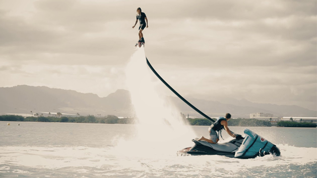 Hovering over the ocean on a fly board in Waikiki