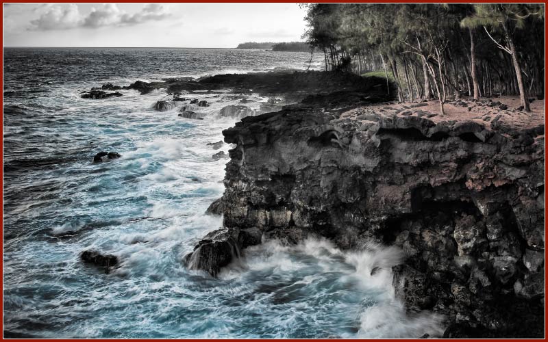 The rugged volcanic coastline where lava meets the sea on Big Island Hawaii