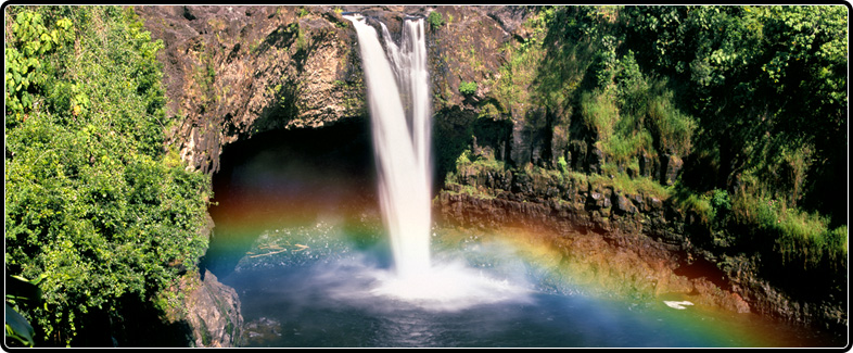Rainbows form on the mist below Rainbow Falls near Hilo