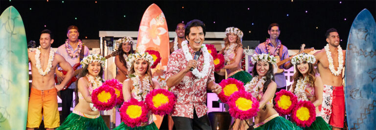Cast of Rock A Hula gathers on stage in Waikiki