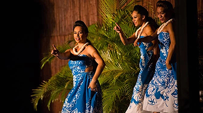 Luau performers dance on stage at the Myth of Maui Luau.