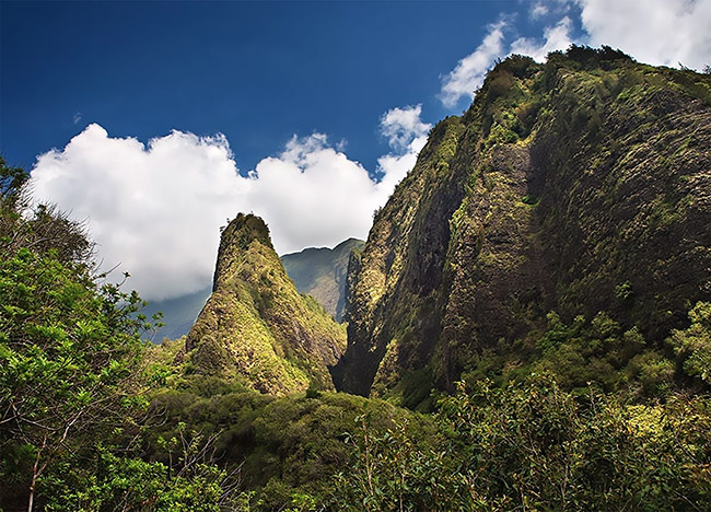 The 'Iao Needle stands high above the lush green valley on Maui, Hawaii.